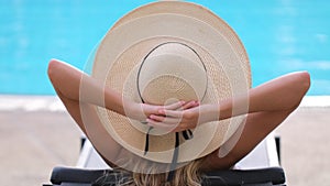 traveler tourist bikini woman girl in hat relaxing vacation happy holiday at luxury hotel tropical resort swimming pool