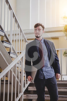 Traveler and tourist  young man wearing backpack using smartphone. Travel backpack concept