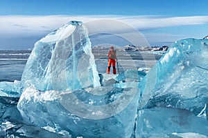 Traveler among transparent Baikal ice