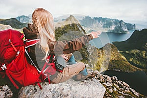 Traveler woman admiring landscape of mountains