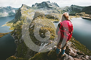 Traveler woman discovering mountains of Norway