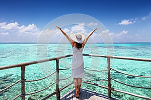 Traveler woman enjoys her tropical vacation