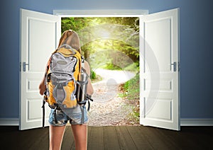 Traveler woman is going to opened doors