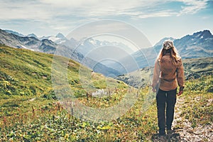 Traveler Woman hiking in mountains