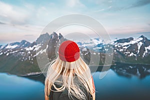 Traveler woman hiking outdoor in Norway travel adventure vacations healthy lifestyle blonde hair girl hiker