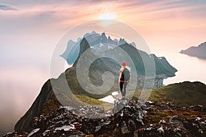 Traveler woman hiking solo in mountains of Norway outdoor activity travel summer vacations healthy lifestyle
