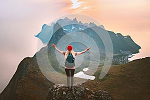 Traveler woman raised hands hiking alone on mountain top outdoor travel summer vacations healthy lifestyle active girl