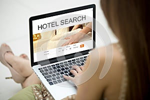 Traveler woman searching for lodging photo