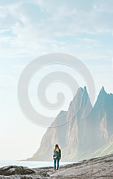 Traveler woman walking in Norway travel lifestyle active vacations outdoor eco tourism