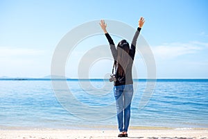 Traveler women see the beautiful beach and blue sky,