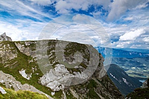 Travelers or hikers in the mountains in the National Park Triglav.