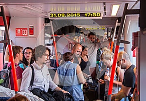 Travelers in overcrowded train heading to Hungary from Austria