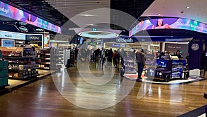 Travelers shopping at duty free shops at Heathrow airport