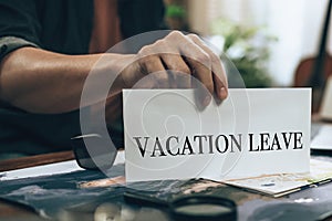 Travelers show vacation leave and planning trips map. Travel concept
