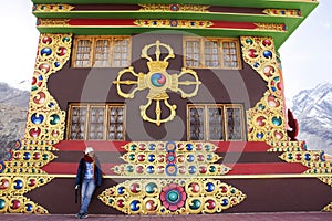 Travelers thai woman travel visit stand for take photo with Maitreya Buddha statue area near Diskit Monastery in Nubra valley