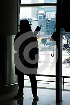 Travelers thai woman walking in terminal go to bus station at Hong Kong International Airport