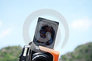 Travelers thai women people travel visit shooting take photo on boat tour trip Tam Coc Bich Dong or Halong Bay on Land and Ngo