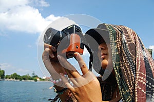 Travelers thai women people travel visit shooting take photo on boat tour trip Tam Coc Bich Dong or Halong Bay on Land and Ngo