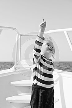 Traveling adventures and wanderlust. summer traveling vacation. childhood happiness. happy small boy on yacht. boat