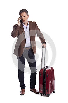 Traveling Businessman Calling for a Rideshare photo