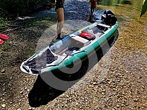 traveling on a canoe raft down the river. inflatable boat with paddles