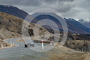 Traveling car driving in road to aoraki - mt.cook national park