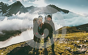 Traveling Couple climbing together in mountains