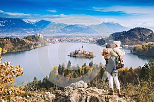 Traveling family looking on Bled Lake, Slovenia, Europe