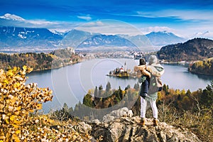 Traveling family looking on Bled Lake, Slovenia, Europe