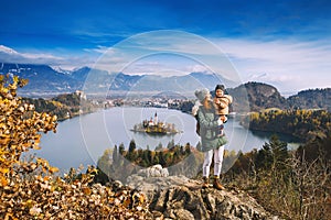 Traveling family looking on Bled Lake, Slovenia, Europe