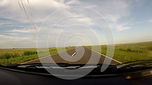 Traveling inside a car in a empty road