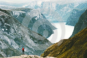 Traveling Man enjoying Naeroyfjord mountains landscape