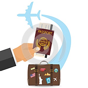 Traveling by plane. A hand holds a passport against the background of luggage and a departing plane. Vacation concept