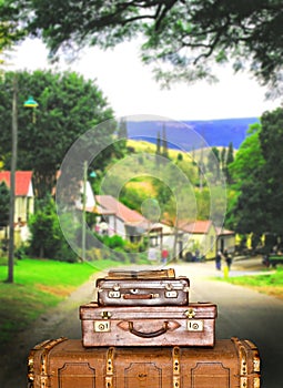 Traveling suitcases in a small town