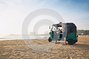 Traveling by tuk tuk taxi