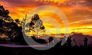 Traveling for watch sunset at the mountain on Kaeng Krachan National Park in Thailand.