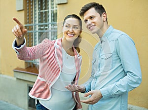 Traveller asking woman direction