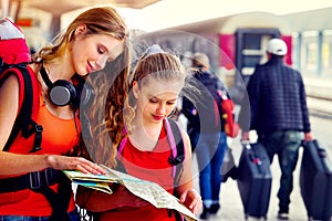 Traveller girl female backpack and tourism outfit at railway station