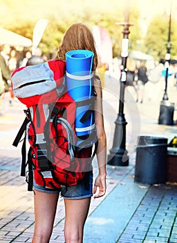 Traveller girls with back view close up red female backpack