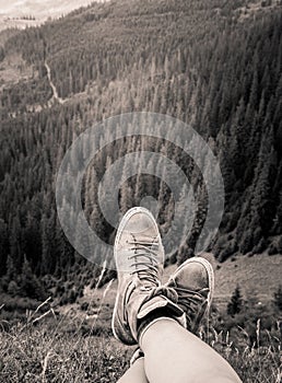 A traveller resting in a mountain landscape in Carpathian mountains