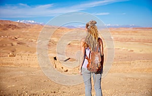 Traveller woman in desert