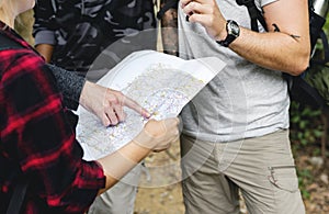 Travellers checking map for the direction photo