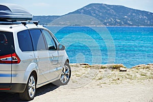 Travelling. Automobile minivan view near sea beach