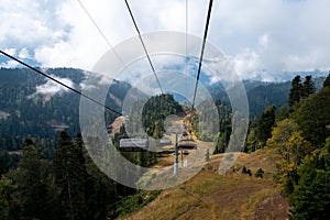 Travelling by cable car high in the mountains