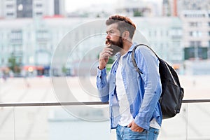 Travelling concept. Tourist on vacation. Hipster modern tourist urban background. Looking for adventures. Tourist