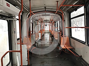 Travelling with a empty tram in winter.