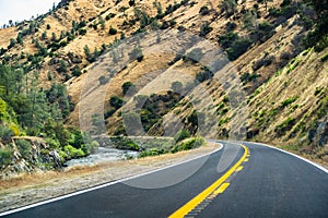 Travelling on Highway 140 along Merced river towards Yosemite National Park, Mariposa county, California photo