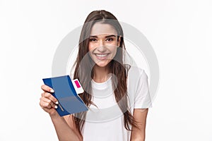 Travelling, holidays, summer concept. Close-up portrait beautiful young woman with long hair, traveller sitting in