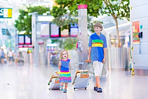 Travelling kids at the airport