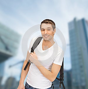 Travelling student with backpack outdoor